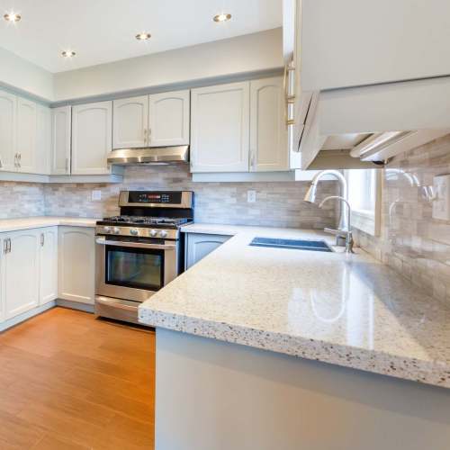 Kitchen with quartz countertop at Flatiron West Trade in Charlotte, North Carolina