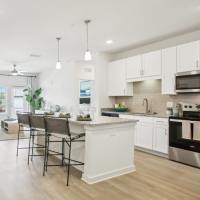 Open concept kitchen at Avion Apartments in Jacksonville, Florida