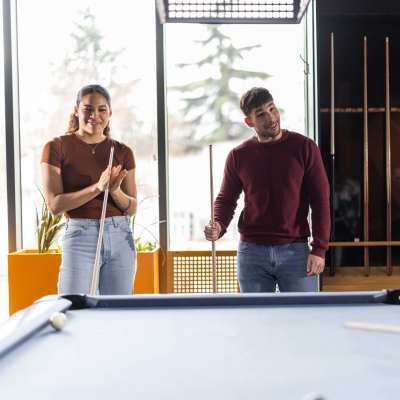 Residents playing pool at Ashley Oaks in Charleston, South Carolina