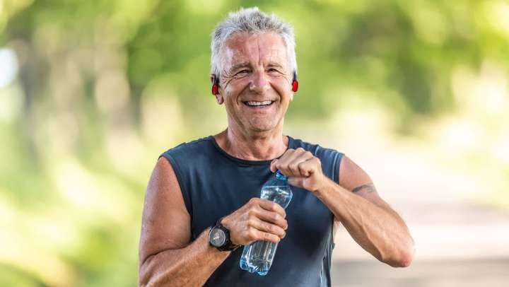 Healthy senior male taking a run at {{location_name}} in {{location_city}}, {{location_state_name}}