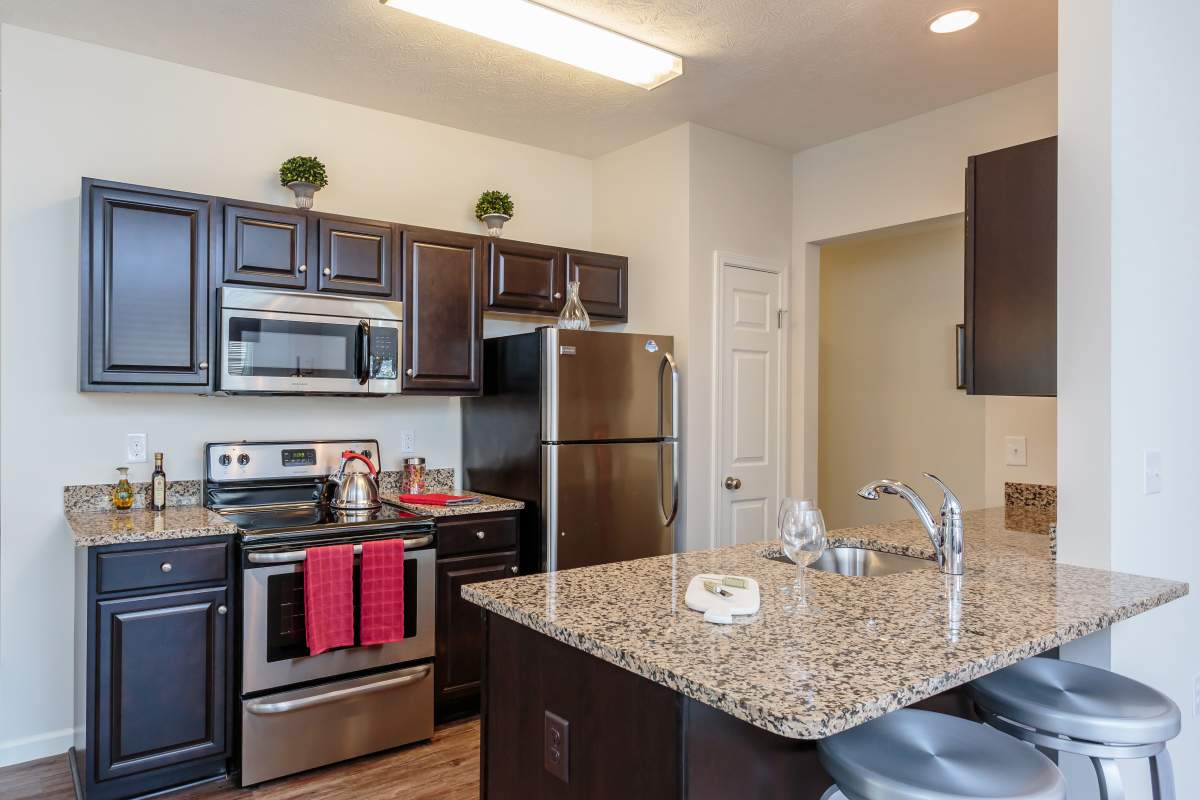 Kitchen at Auburn Creek Apartments in Victor, New York