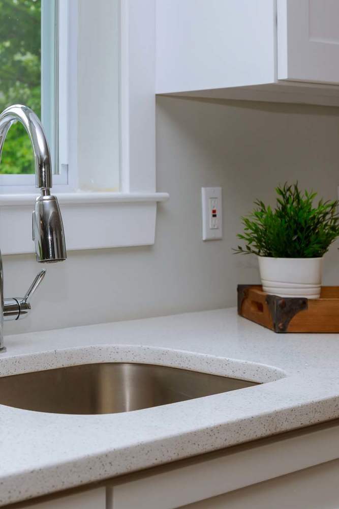 Kitchen with water sink at El Patio Apartments in Laredo, Texas