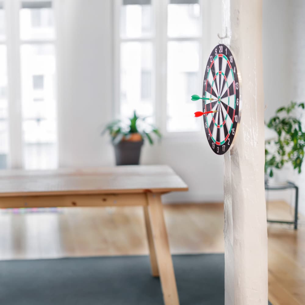 Dartboard mounted on a pillar at Titan Court in Eugene, Oregon