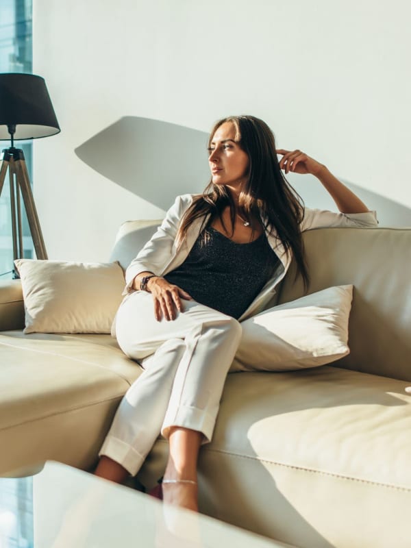 Happy resident relaxing at 1200 Riverside in Burbank, California