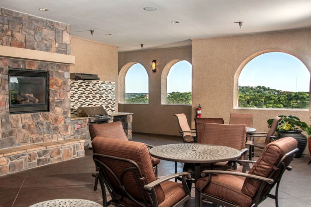 Open air lounge with fireplace at West Lake Vistas in Austin, Texas