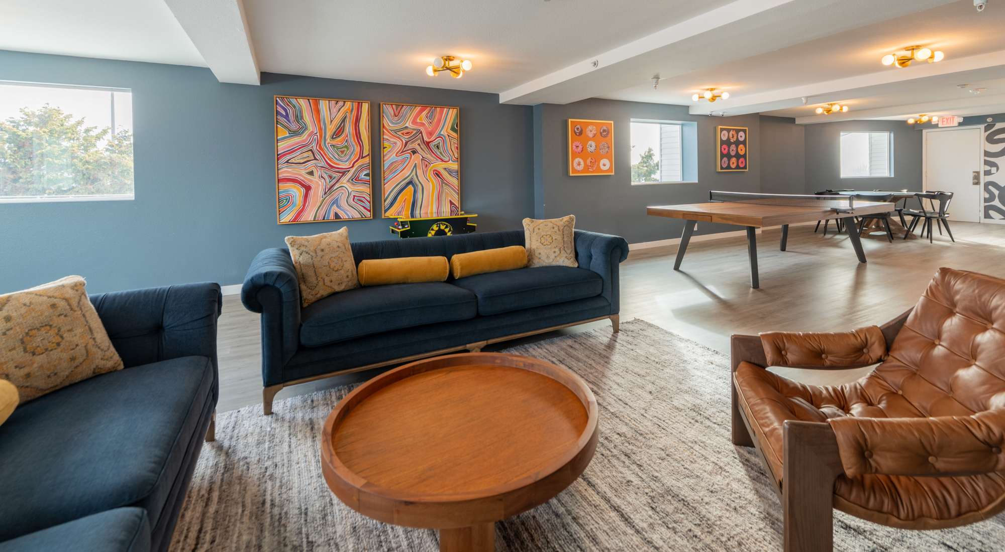 Community lounge with games at Thea Apartments in Tacoma, Washington