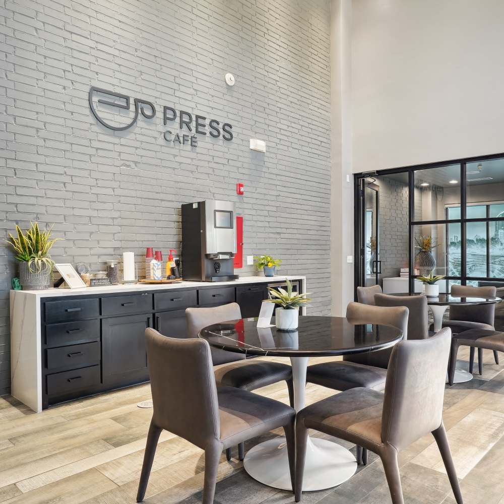 Clubhouse with coffee machine and seating area at Trinity Bluff & Trinity District in Fort Worth, Texas