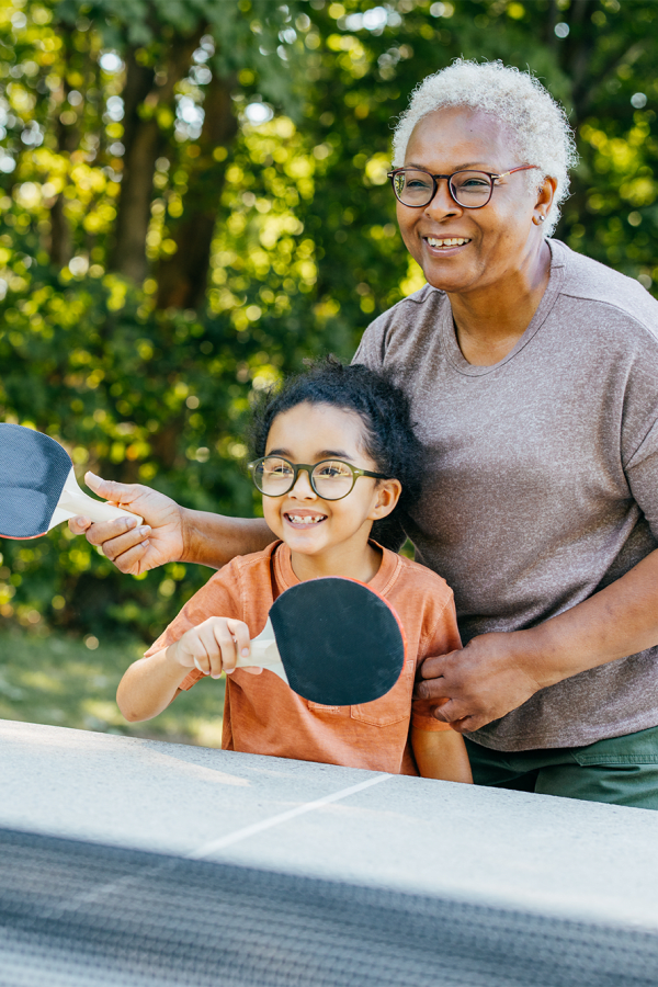 Resident and granddaughter playing table tennis at Turners Rock in Springfield, Missouri