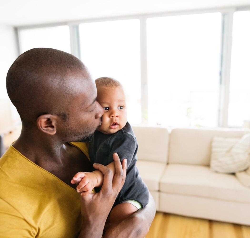 Father and son in their new home at Aspire at 610 in Houston, TX