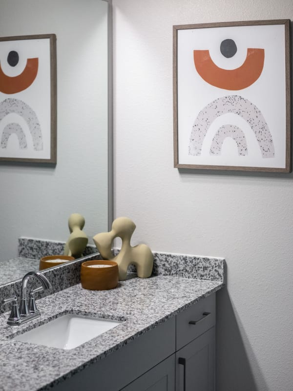 Bathroom with granite countertops at Bellrock Memorial in Houston, Texas