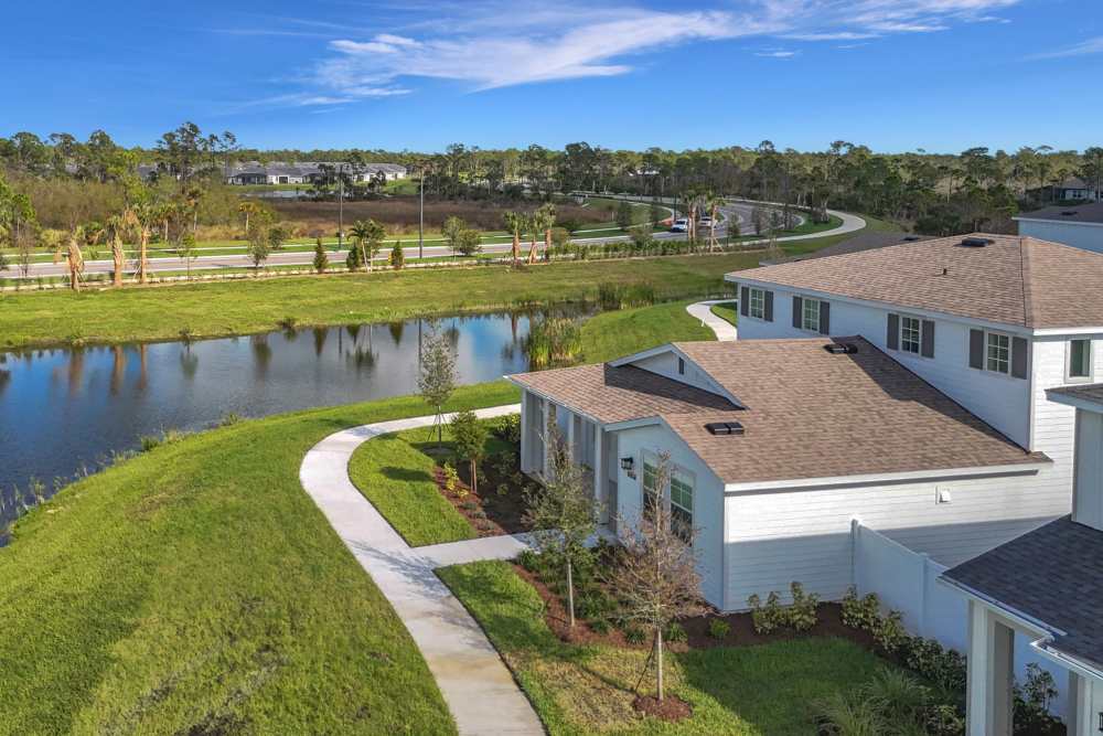 Aerial view featuring walking trails & waterfront at BB Living Wellen Park in Venice, Florida