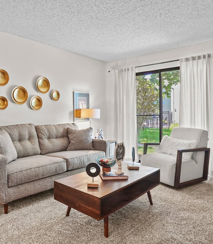 Spacious living room at Raintree Apartments in Wichita, Kansas