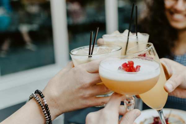 Resident enjoying drinks in bar near Collier in Pflugerville, Texas
