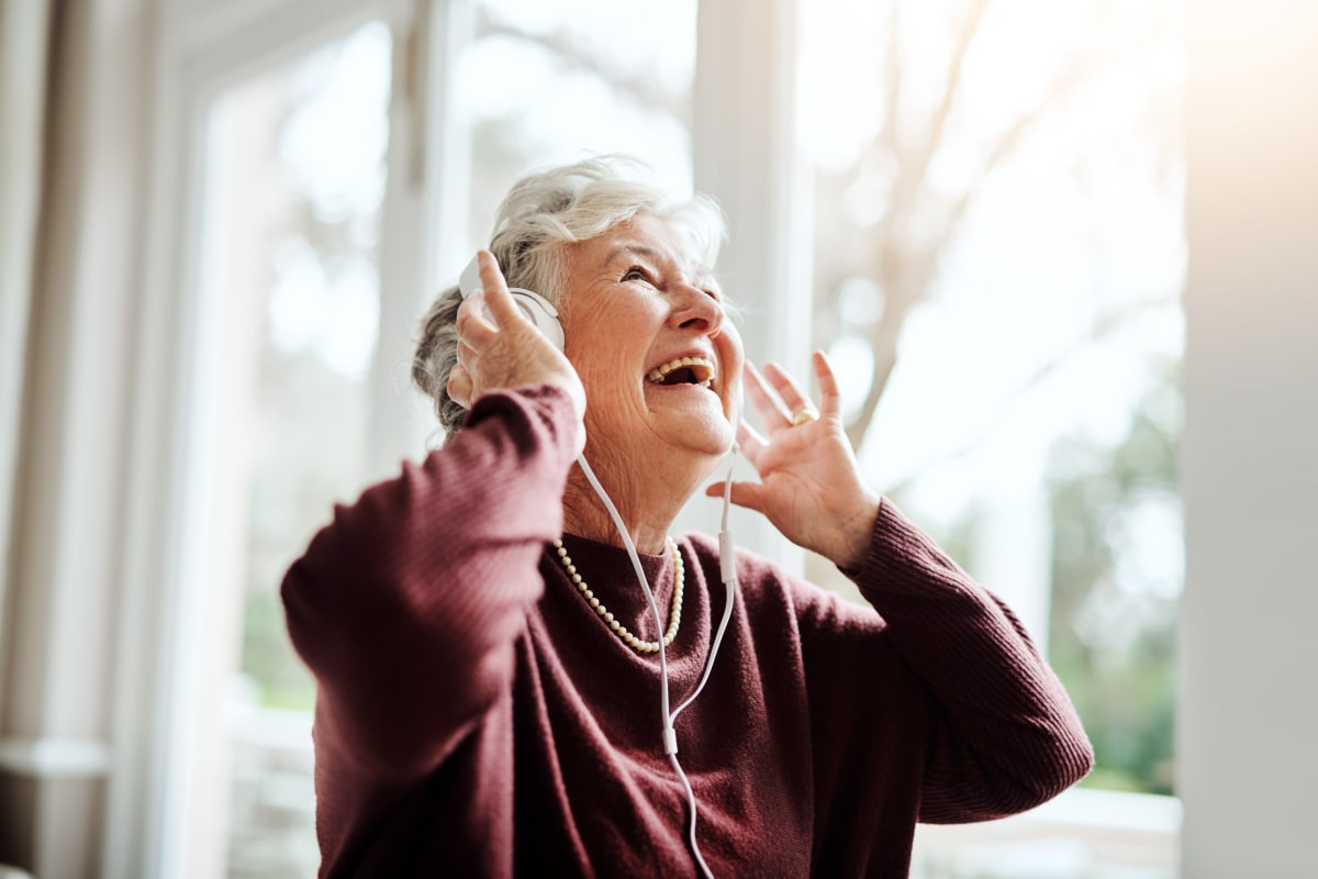 Resident enjoying listening to music at Brentwood at LaPorte in La Porte, Indiana