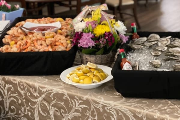buffet table with shrimp and oysters at The Village at Summerville in Summerville, South Carolina