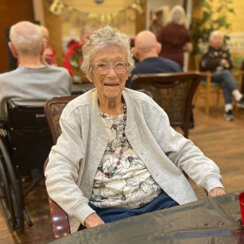 Resident holding a balloon at Oxford Glen Memory Care at Owasso in Owasso, Oklahoma