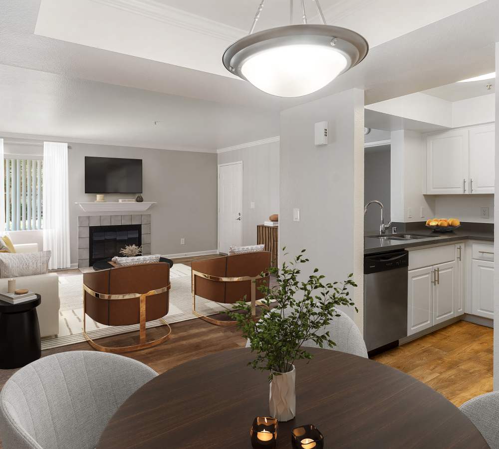 Well lit living room with fireplace at Mill Springs Park Apartment Homes in Livermore, California