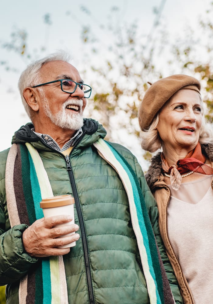 A man and women take a walk near at Logan Creek Retirement Community in Mount Vernon, Washington