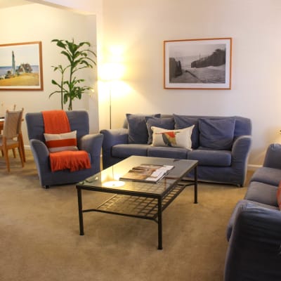 A furnished living room in a home at The Village at NTC in San Diego, California