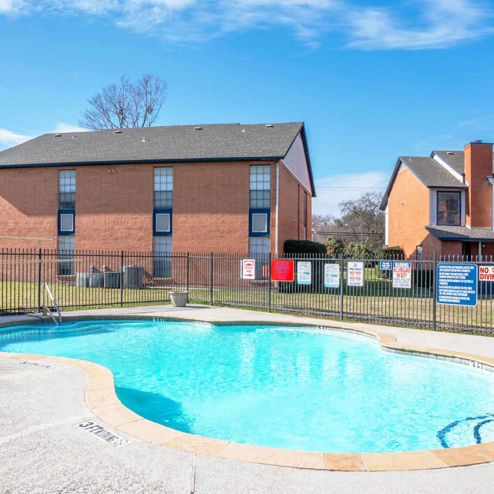 Resort-style pool area at Plantation West in Hurst, Texas