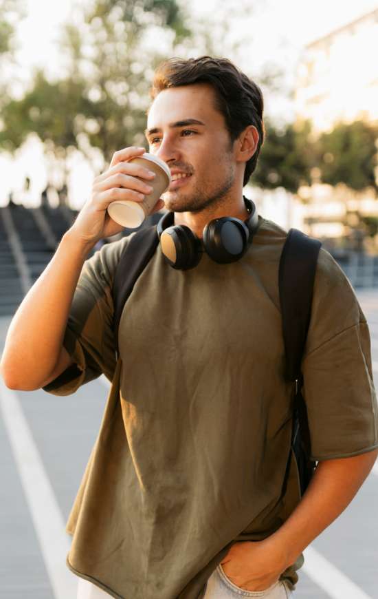 Student having coffee at Brookside Downtown in Columbia, Missouri