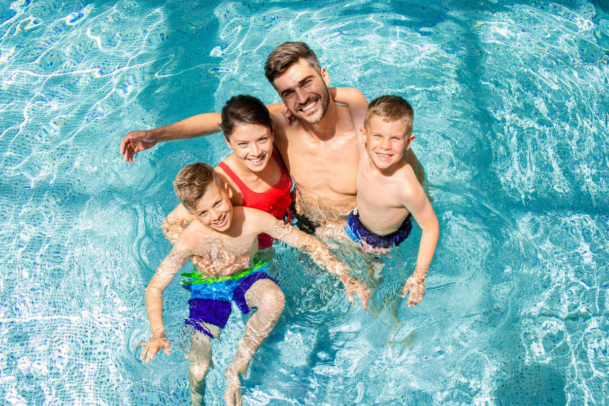  Resident having a fun time in the swimming pool at Azalea Park III in Meridian, Mississippi