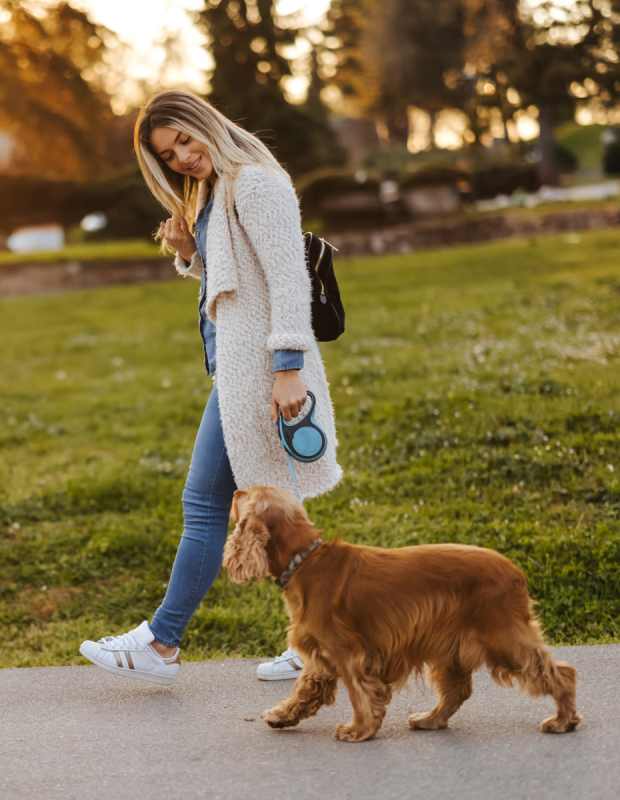 Woman walking a dog at The Annex at Bridgeton in Portland, Oregon