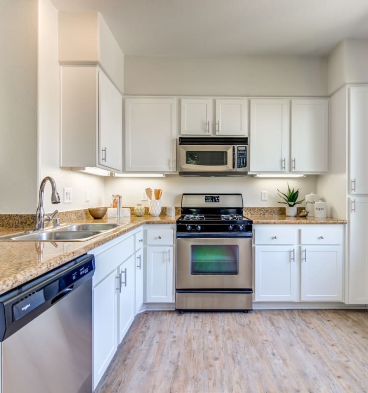 Open, spacious kitchen in a model home at Sofi Shadowridge in Vista, California