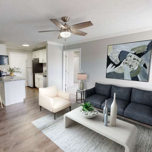 Living room with view of the kitchen at Lakefront at West Chester in West Chester, Ohio