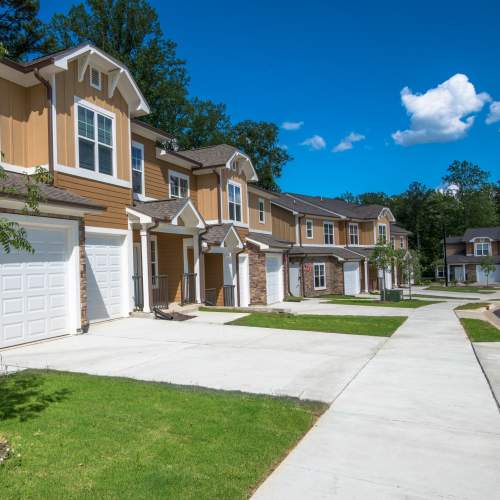 Exterior view with grassy pathway at Lodge at Croasdaile Farm in Durham, North Carolina