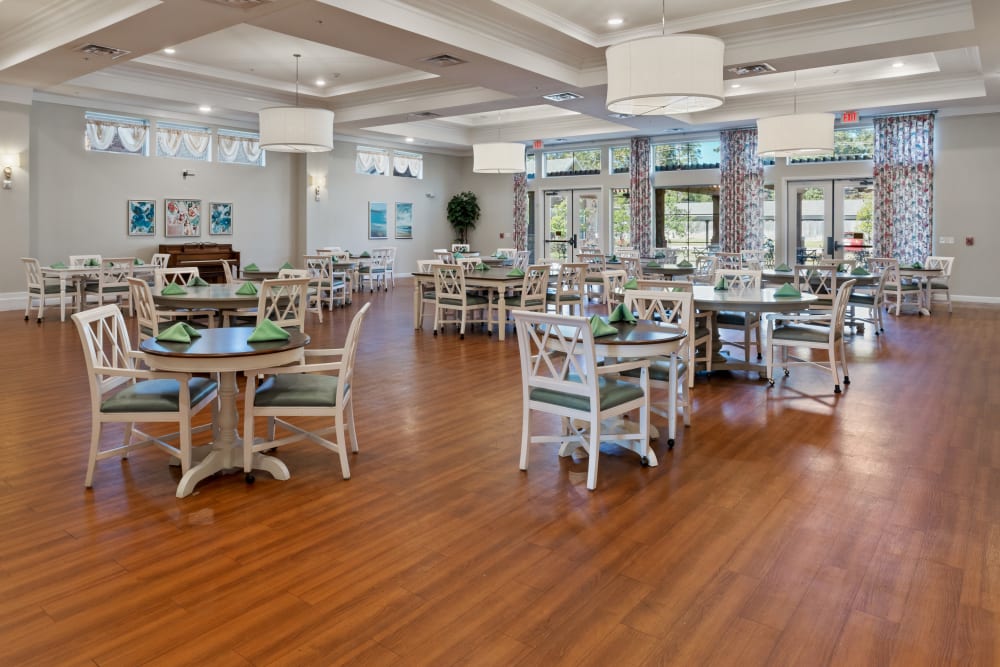 Dining hall with hardwood floors at Wood Glen Court in Spring, Texas