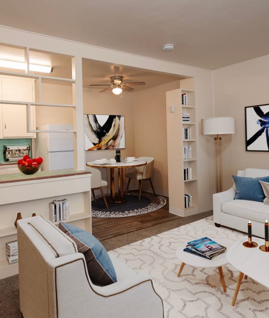 Kitchen and living room area at Coralaire Apartments in Sacramento, California
