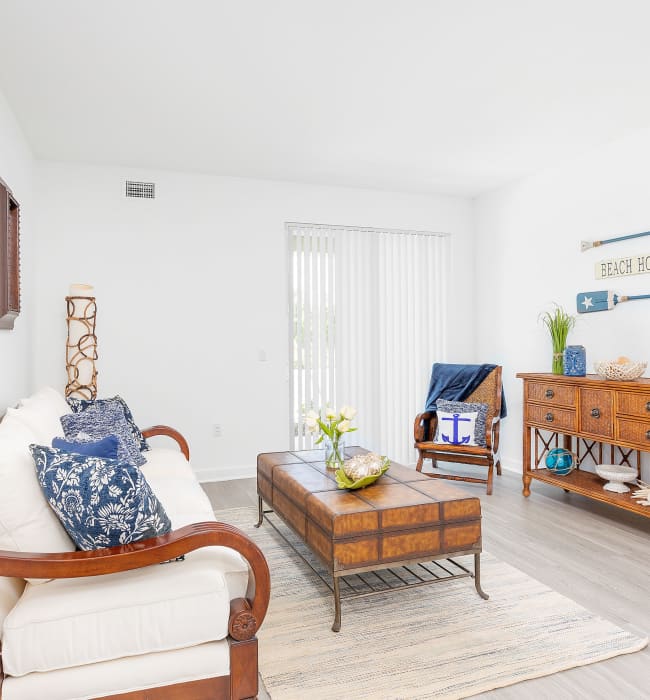 model living room at Quantum Lake Villas Apartments in Boynton Beach, Florida