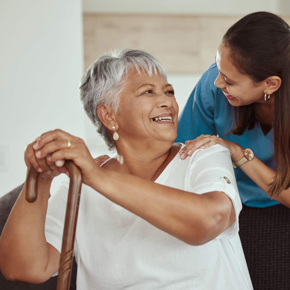 Resident with caretaker at Clearwater at Glendora in Glendora, California