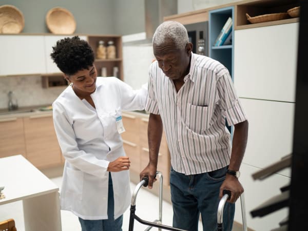 A health professional helping a patient at Careage Home Health in Bellevue, Washington. 