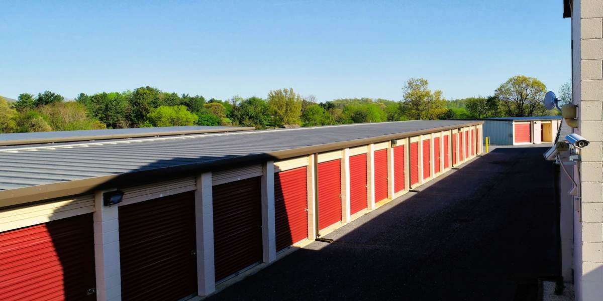 Outdoor units with red doors at Neighborhood Self Storage