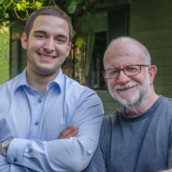 Father and son standing together at Carefield Pleasanton in Pleasanton, California