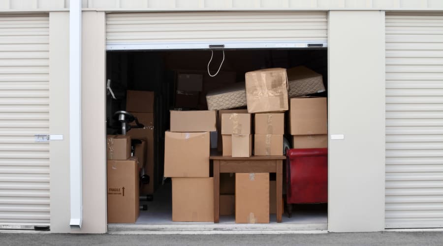 A storage unit filled with boxes at KO Storage in Hampton, Georgia