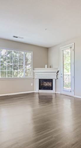 Living room with fireplace at Panorama at Arvada Ridge in Arvada,Colorado