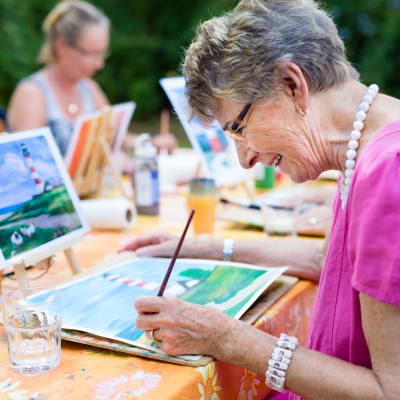 Resident taking an art class at Westminster Memory Care in Lexington, South Carolina