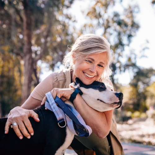 A resident holding her dog at Ben Moreell in Norfolk, Virginia