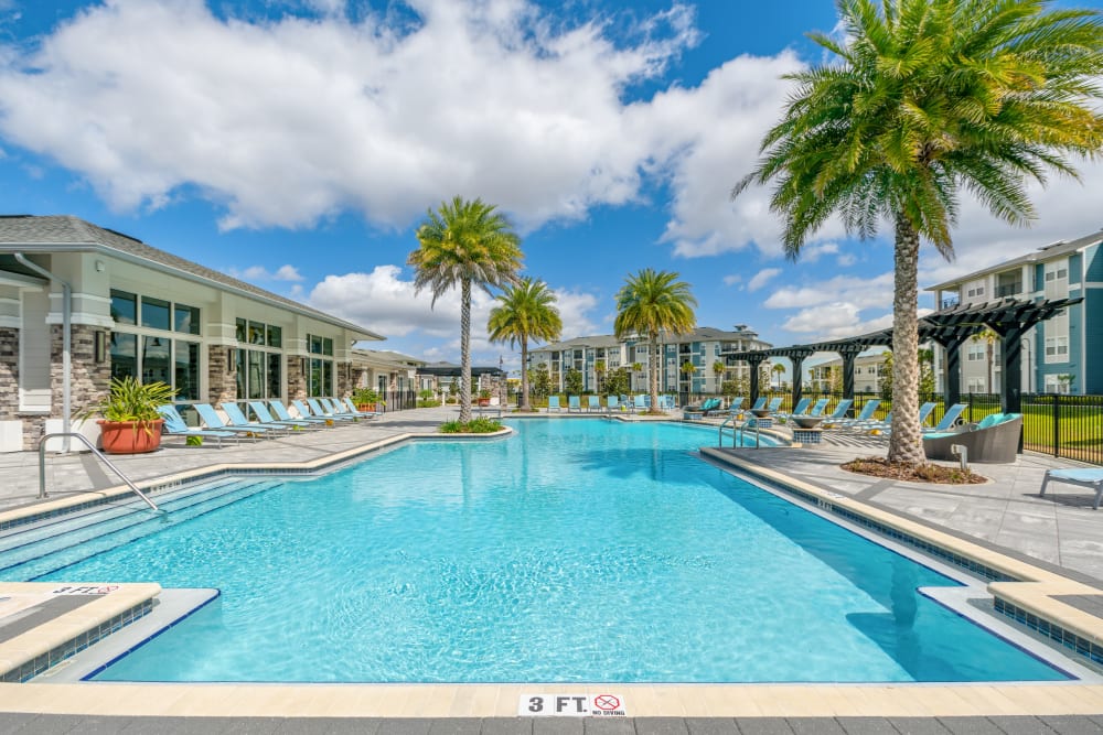 Beautiful resort inspired pool at Champions Vue Apartments in Davenport, Florida