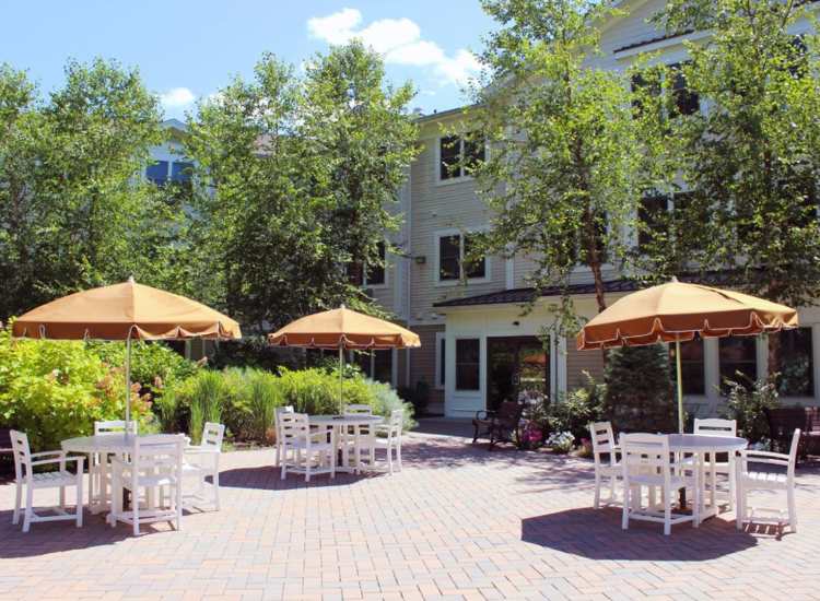 Outdoor seating area at Barstow Village in Hanover, Massachusetts