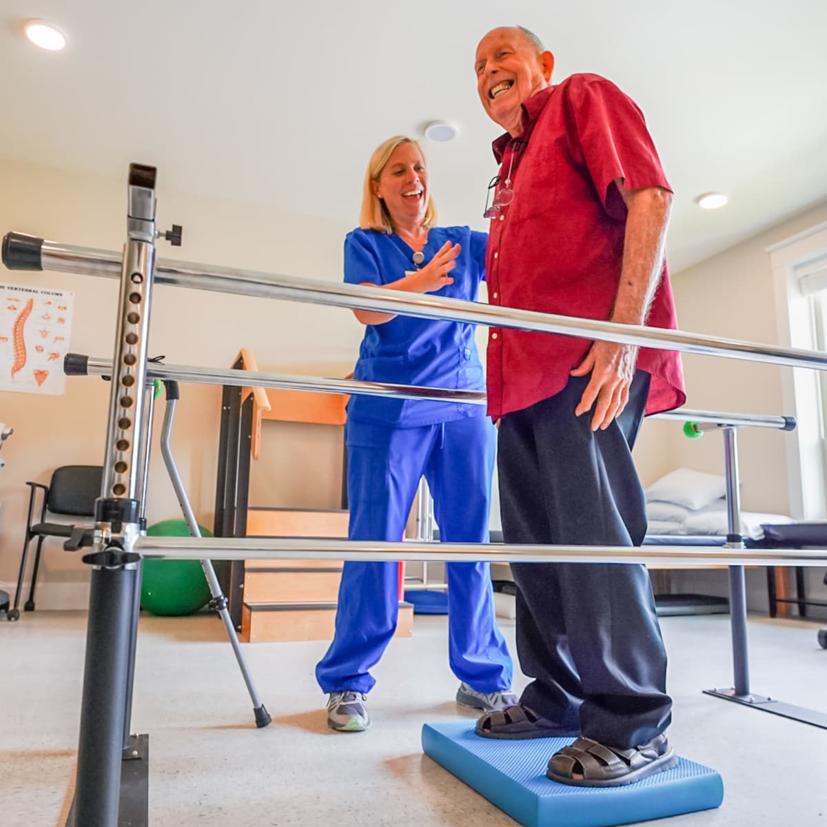 Friendly nurse assisting a resident at Harmony at Laurel in Laurel, Maryland