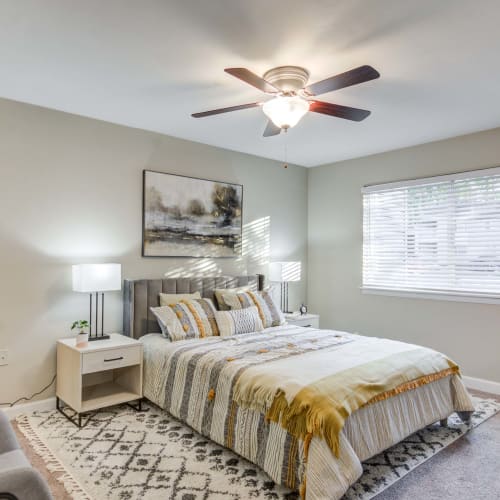 Bedroom with nice ceiling fan at The Point at Beaufont in Richmond, Virginia