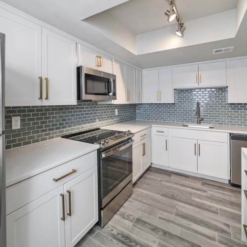 Kitchen with wooden flooring at Cyprus in Phoenix, Arizona