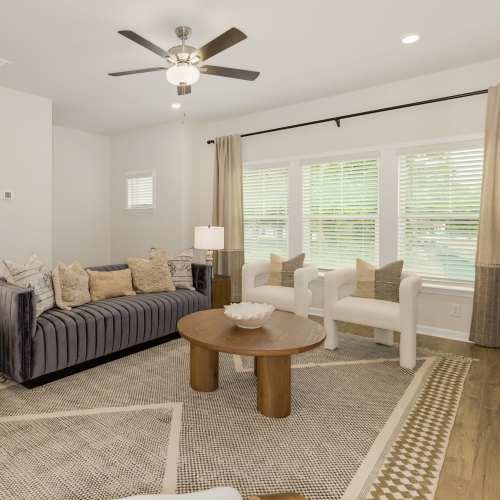 Spacious living area at The Courts at Maverick Yards in Mauldin, South Carolina