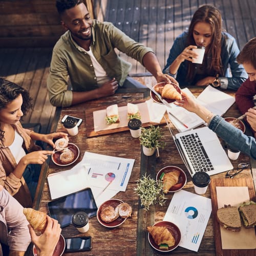 Residents are eating and working at cafe near Prospect View in Santee, California