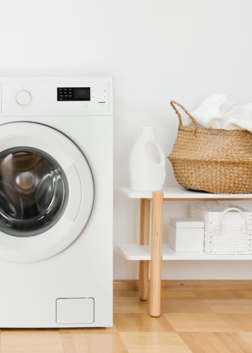 washer and dryer at Encore at Lake Forest Trail in Brighton, Michigan