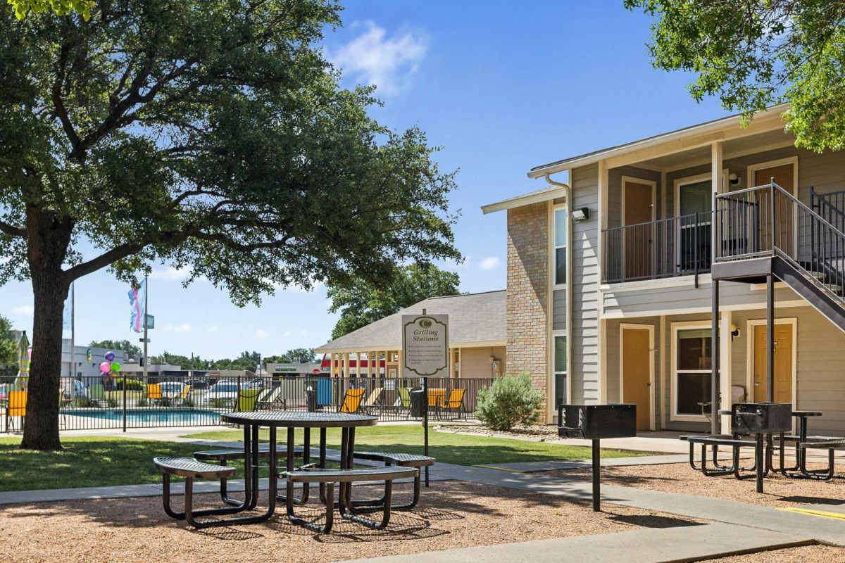 Picnic area with grills at Creekside in San Angelo, Texas